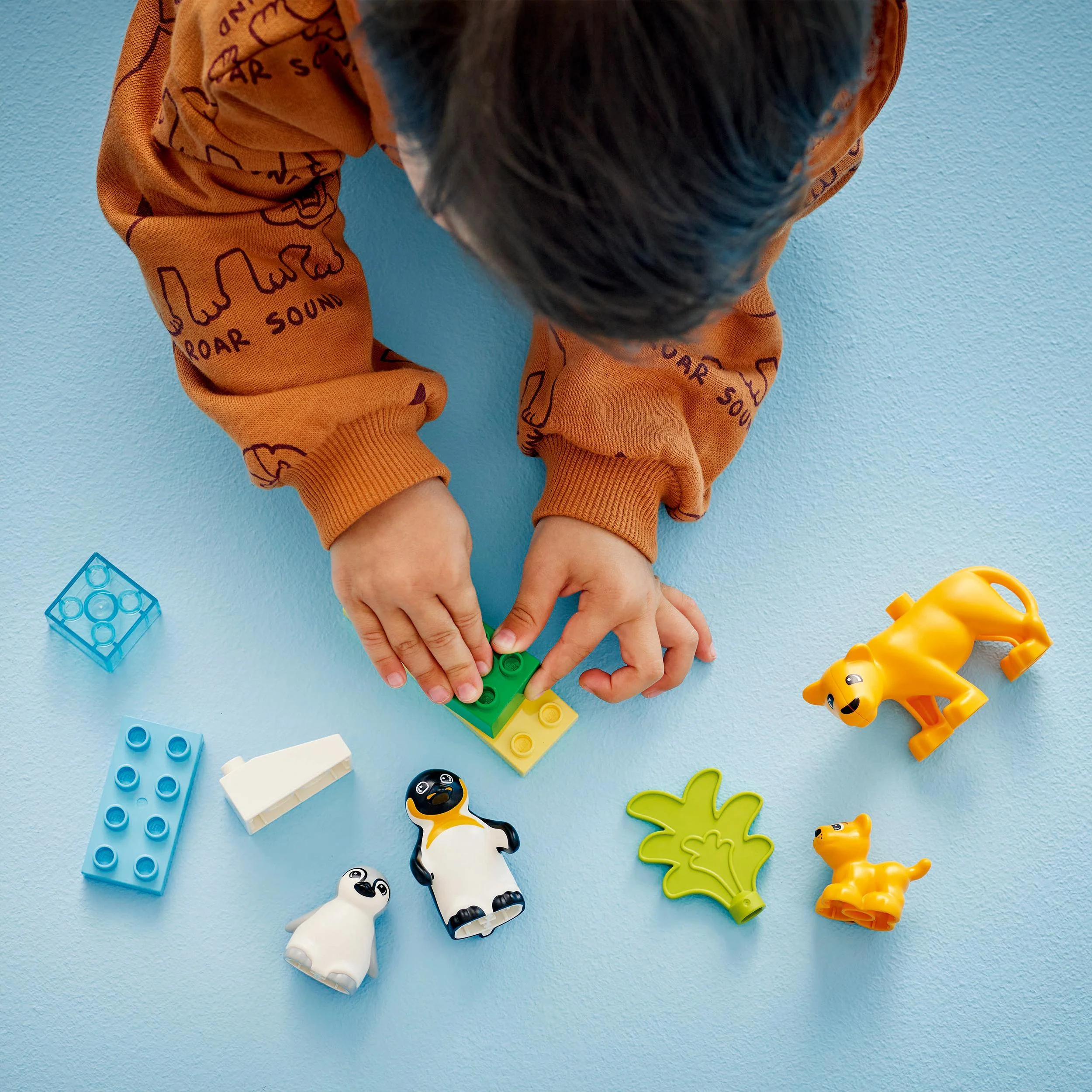 LEGO 10442 DUPLO Wild Animal Families: Penguins & Lions - Image 7